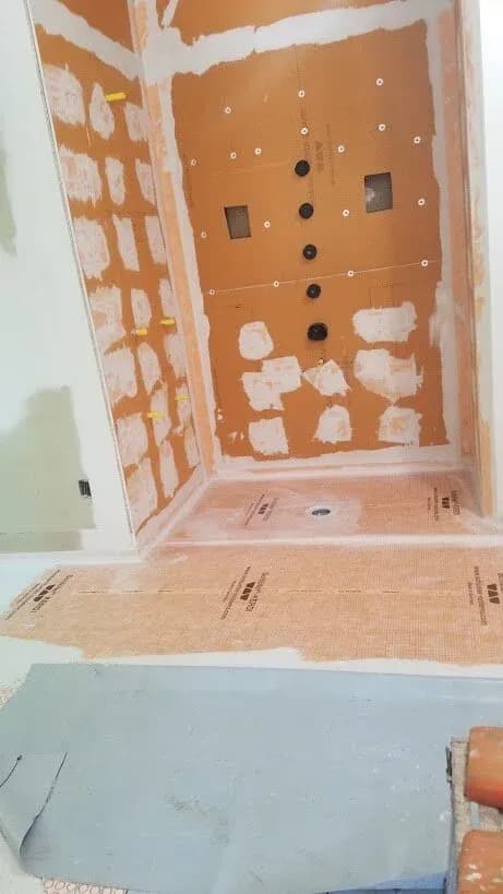 This floor was also heated, so it added another layer of complexity. We always are sure to waterproof well outside the wet area, and we also water proof up the walls with kerdi band.