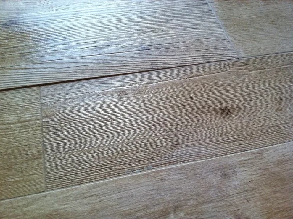 Image 5: This could have been avoided by not using a 1/16" grout joint and also not setting the tile brick set. Basic, common sense stuff if you hire an installer that performs due diligence and is willing to speak up.