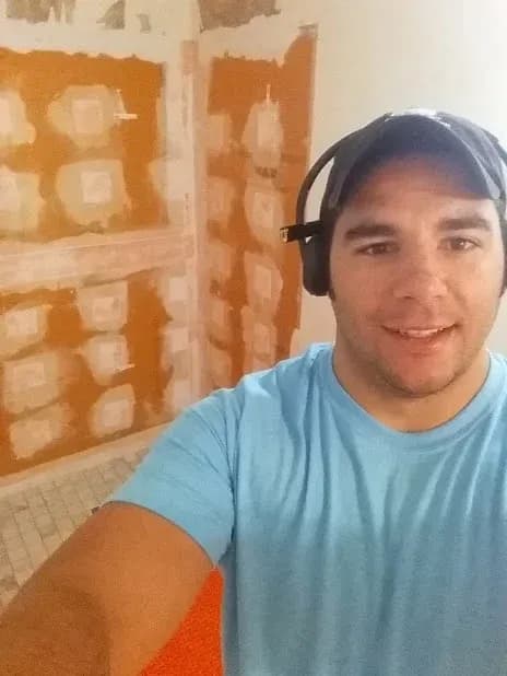 A full Schluter Systems shower with a standardized installation process and a 10 year warranty. The other guys are cheaper because they do not offer this level of moisture management. I'm Ben and I take immense pride in my work.