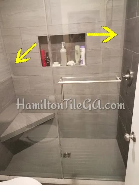 Image 6: Nothing bugs an installer more than small pieces. But with a bathroom like this, with tile wrapped around the entire space (wainscoting) if you shift the pattern to make bigger pieces in one area, the problem of a small piece manifests itself somewh…
