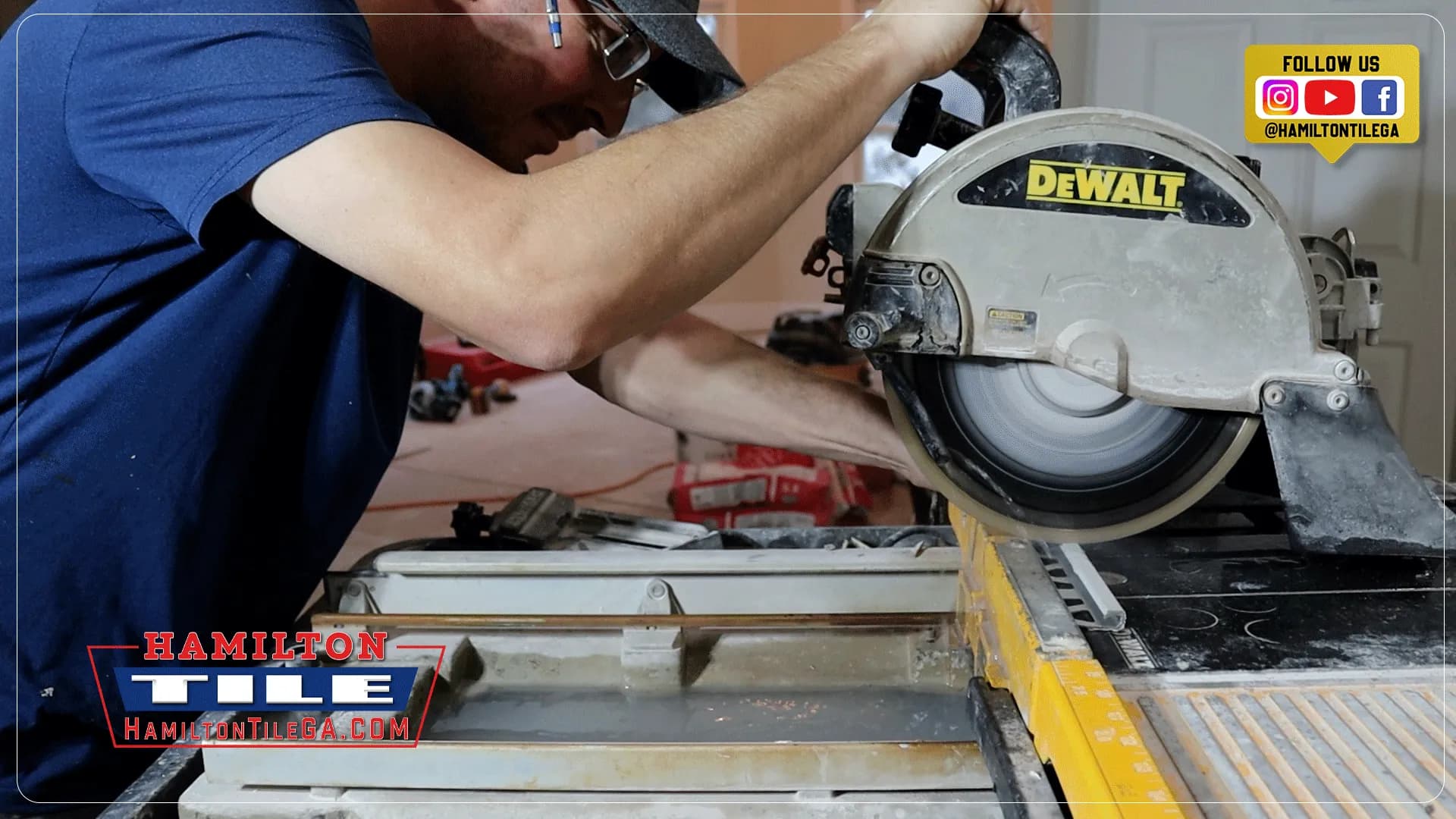 Worker using a DeWalt tile saw to cut tile, with Hamilton Tile branding visible on the image