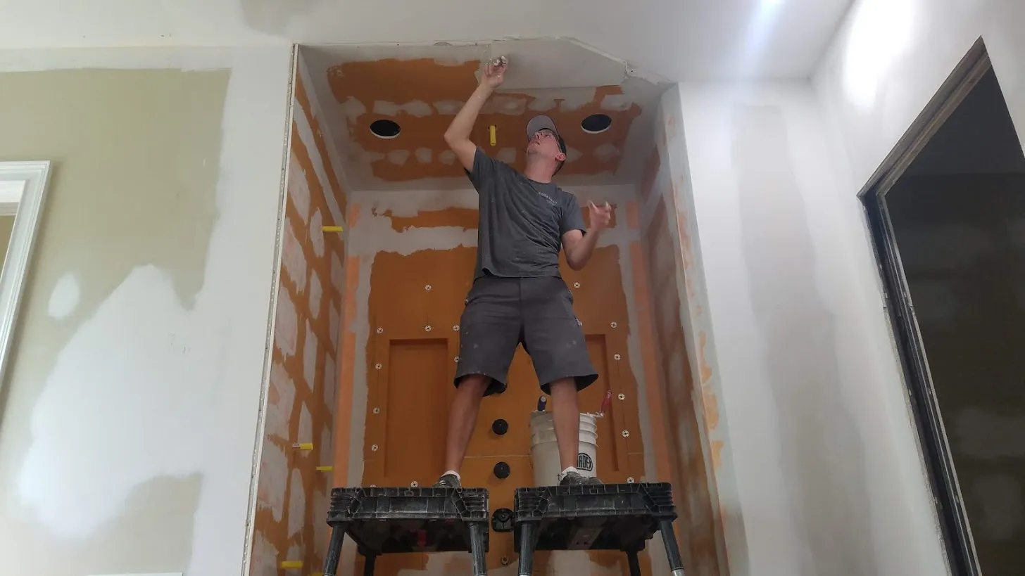 Tiling a custom shower ceiling in Johns Creek, GA.