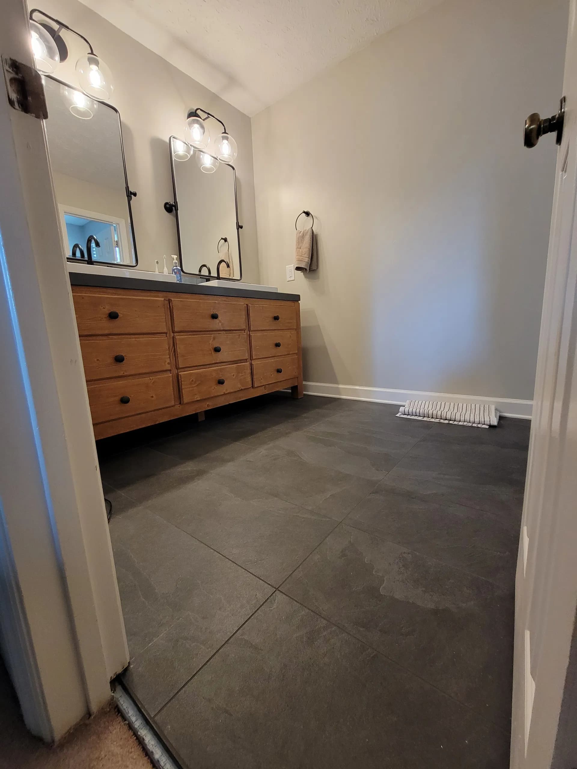 wide angle shot of bathroom entrance in a bathroom remodel in Milton, GA